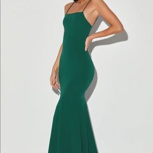 Green tiered trumpet dress